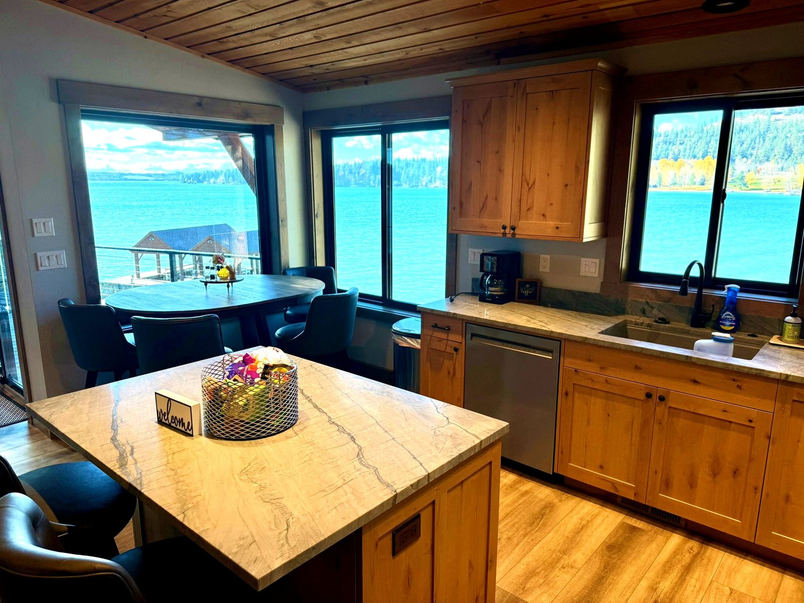 Kitchen dining area with Flathead Lake views at Eagle's Bluff Lakeside House