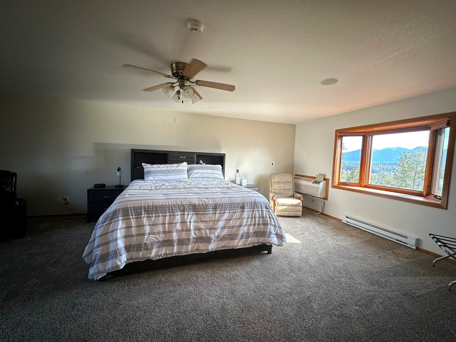 Penthouse bedroom suite with panoramic views at Eagle's Bluff estate