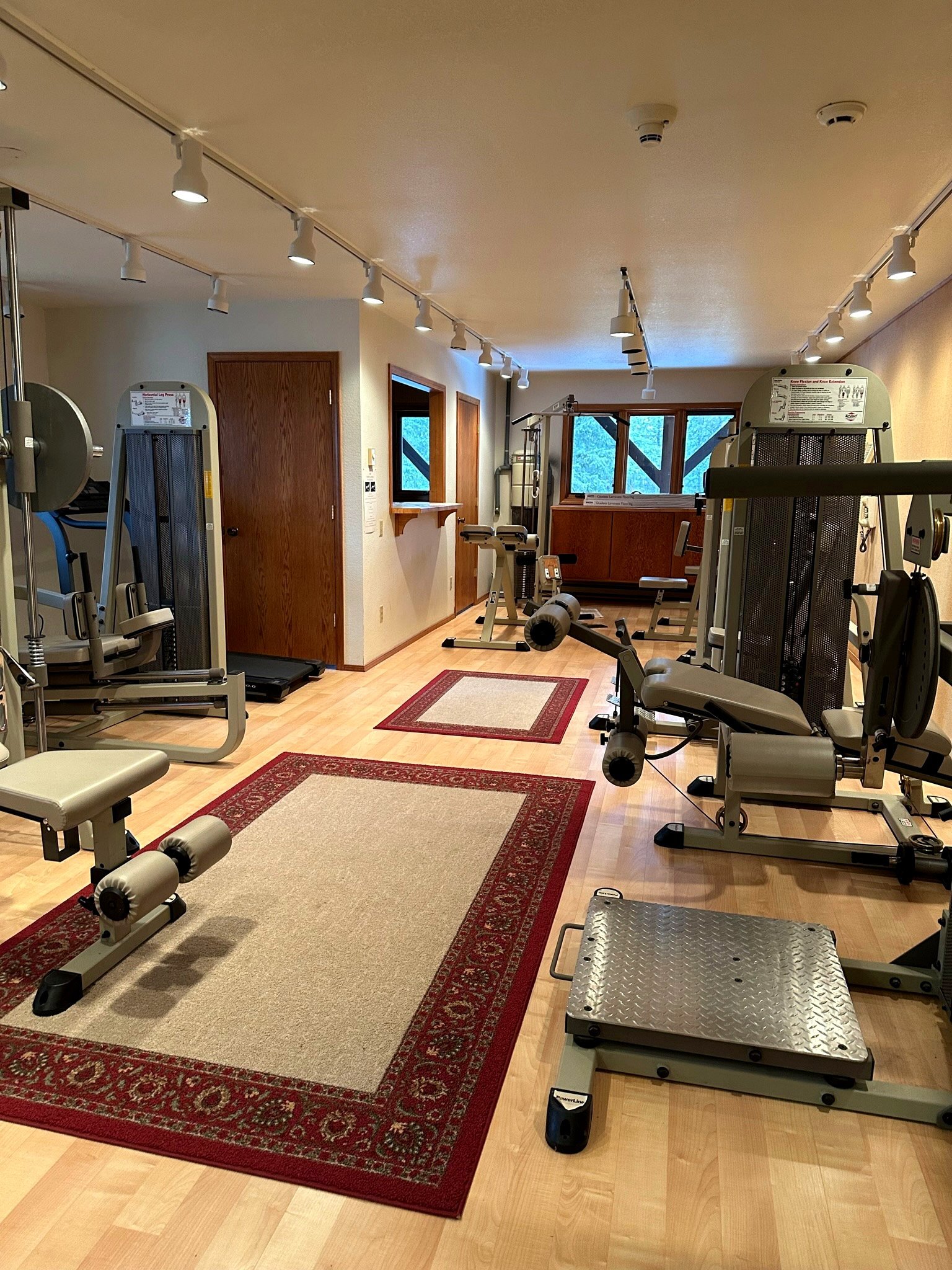 Full-size fitness center and gym at Eagle's Bluff luxury estate on Flathead Lake