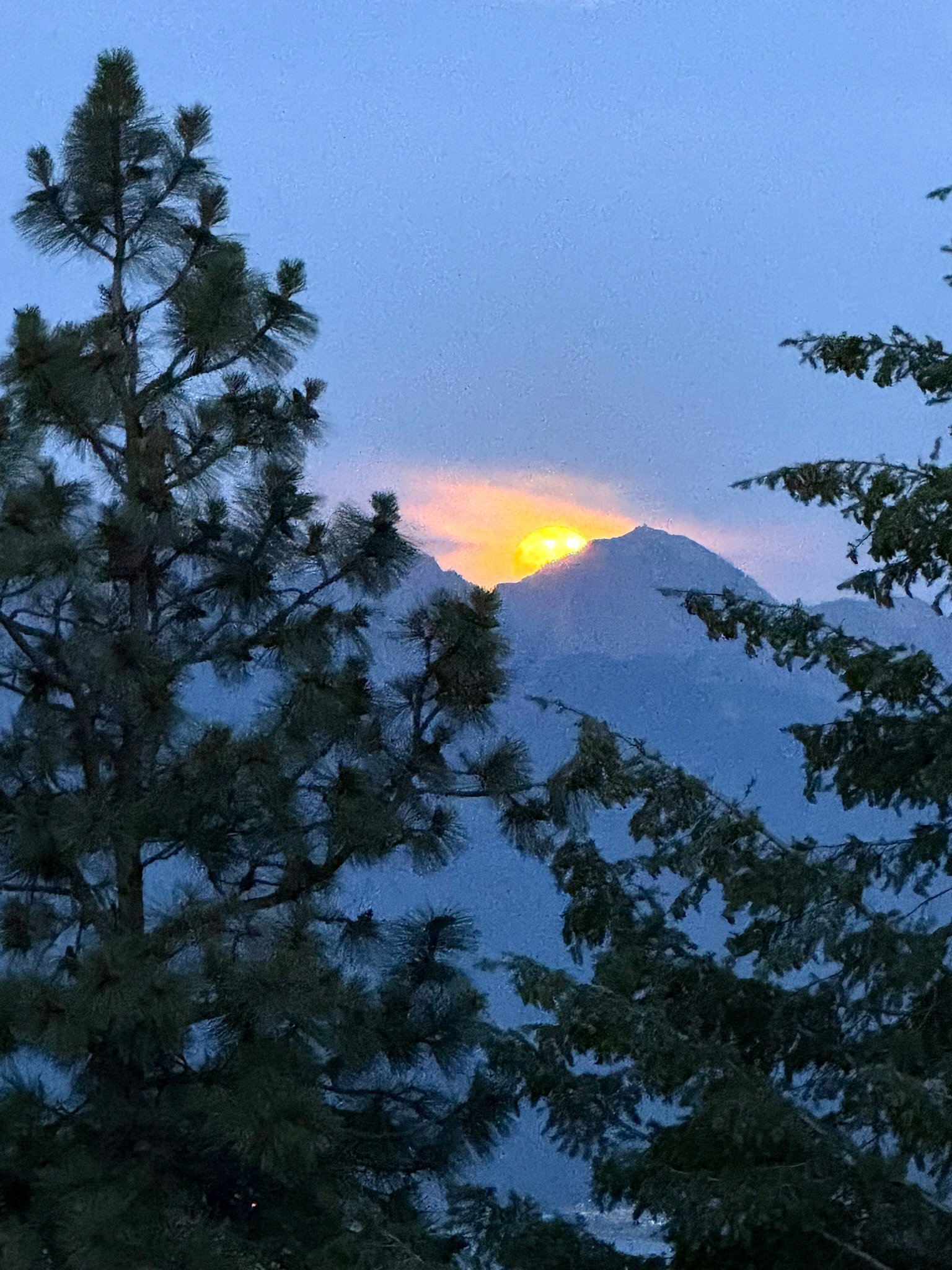 Moonrise over the Mission Mountains viewed from Eagle's Bluff on Flathead Lake