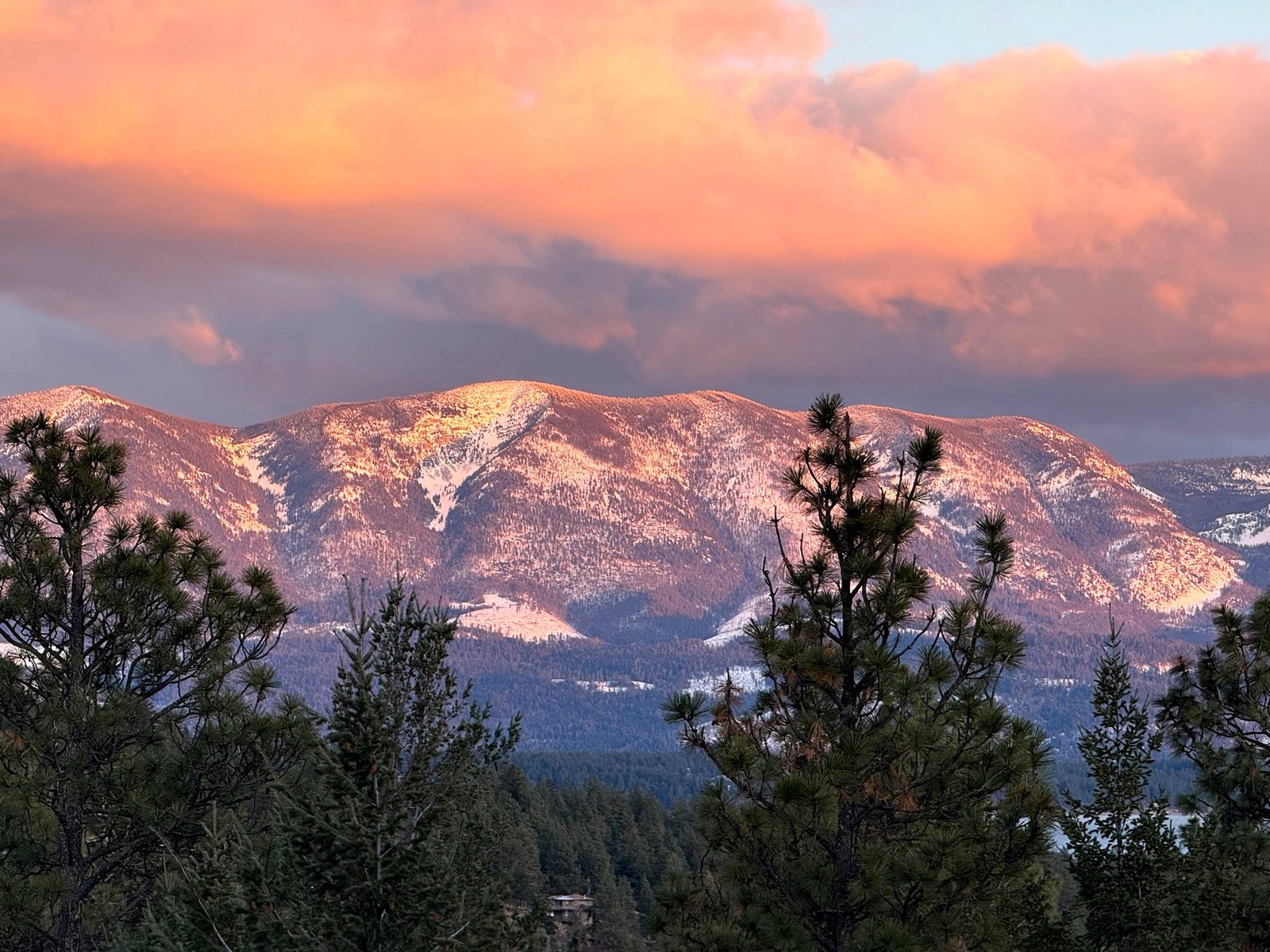 Snow-capped Mission Mountains viewed from Eagle's Bluff estate near Polson, Montana