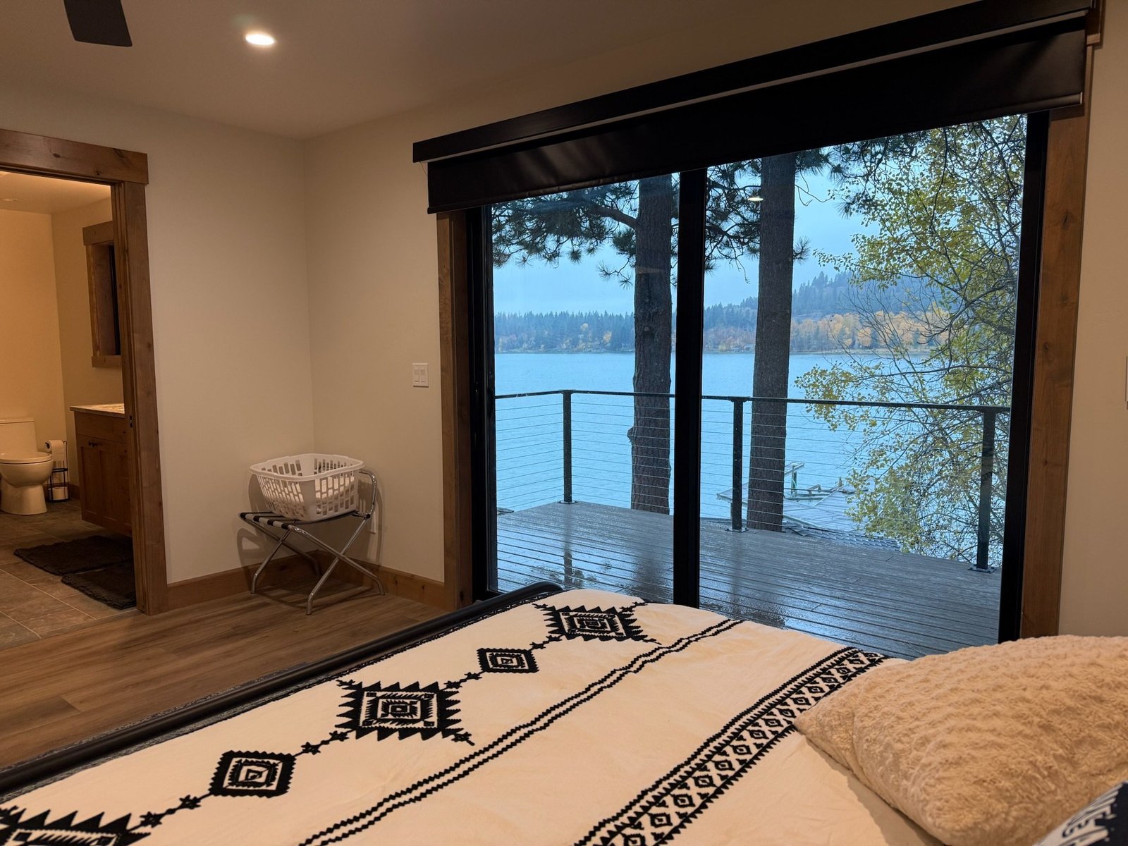 Bedroom with lake views in Eagle's Bluff Lakeside House near Polson, Montana