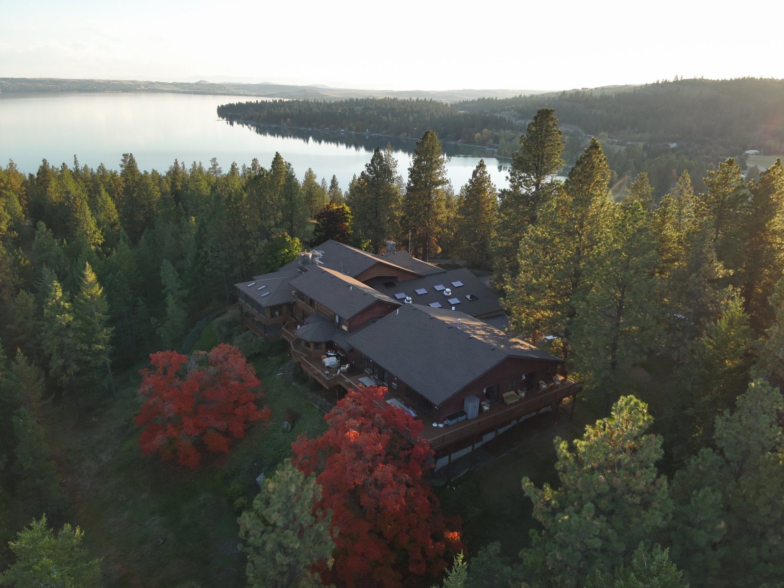 Eagle's Bluff Main House exterior — 20,000 sq ft hilltop residence on Flathead Lake