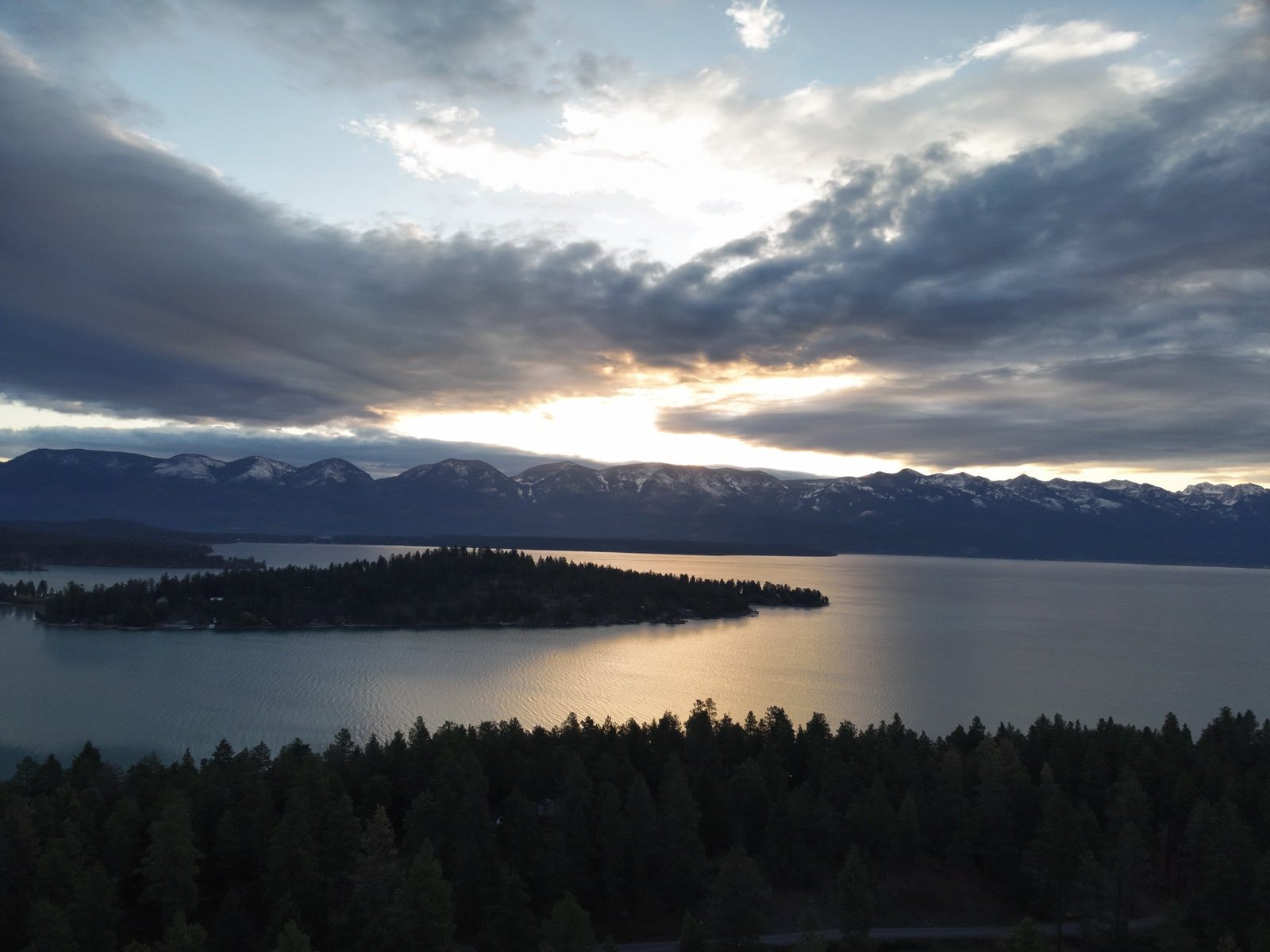 Eagle's Bluff autumn vista showing full estate grounds and Flathead Lake shoreline