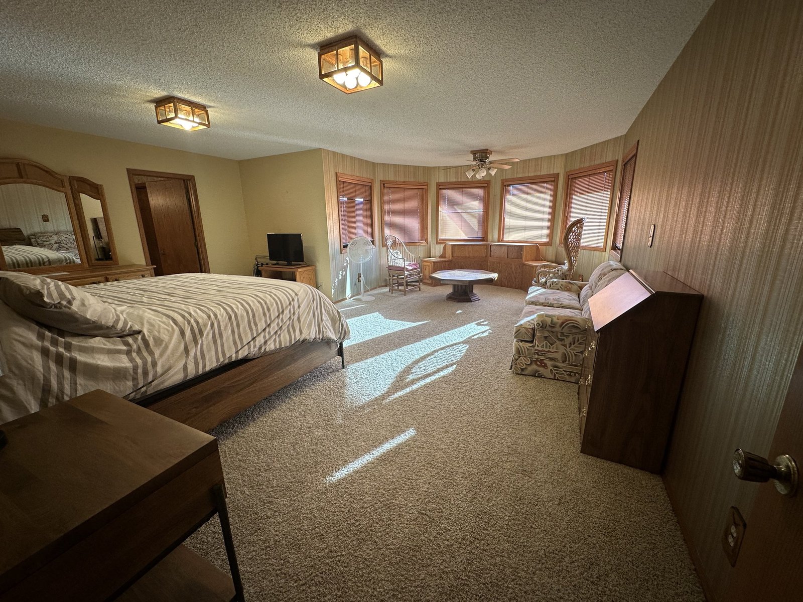 Spacious living area with panoramic Flathead Lake views at Eagle's Bluff Main House